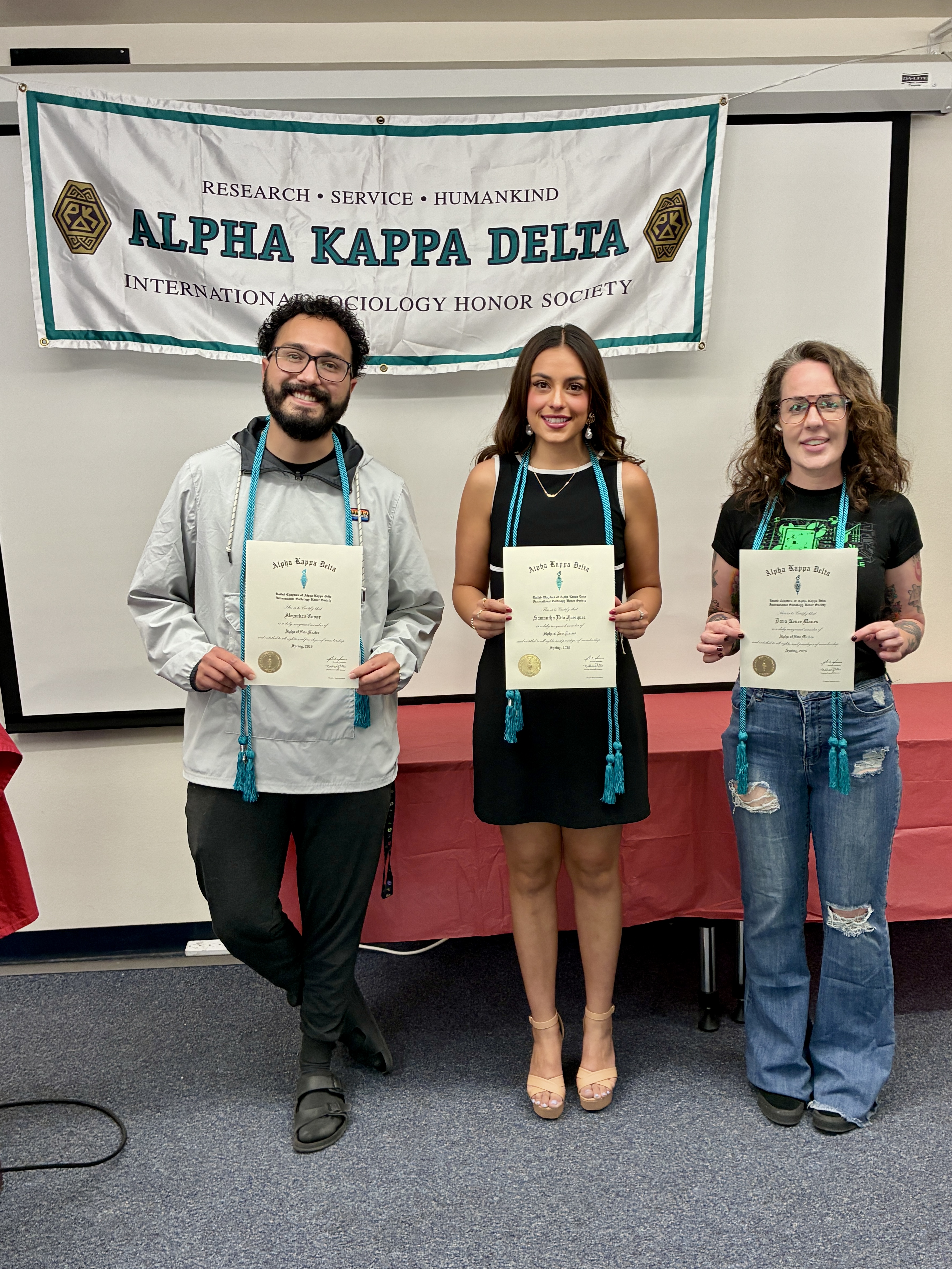 Students holding AKD certificates