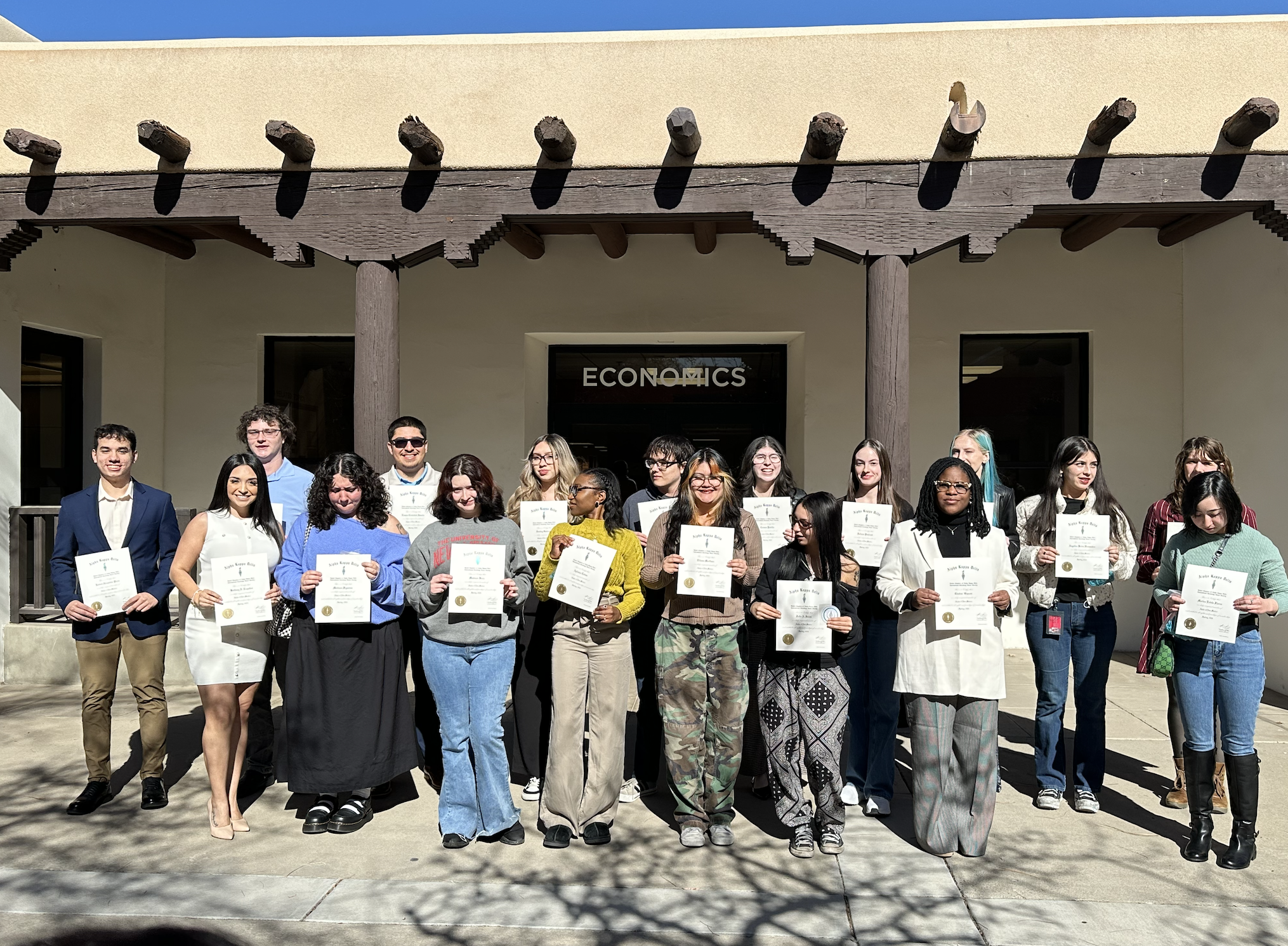 Students holding AKD certificates